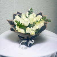 Serenity White Rose Medley, White Roses, Eucalyptus, Black Wrapping, White Ribbon
