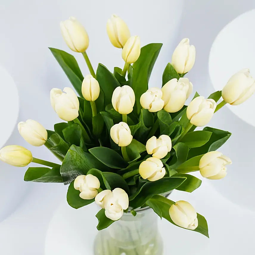 20 White Tulips in glass Vase