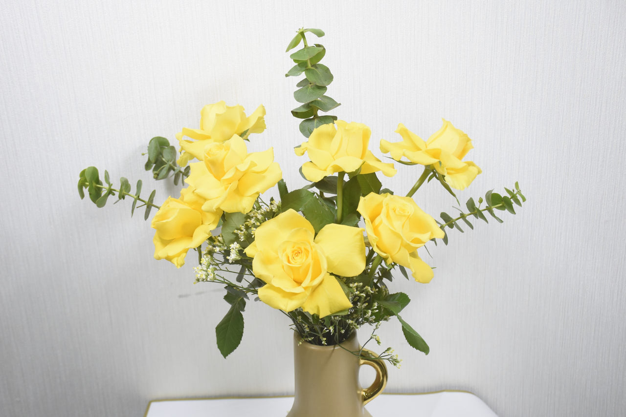 Yellow Rose Harmony: Elegant Floral Arrangement in Ceramic Vase