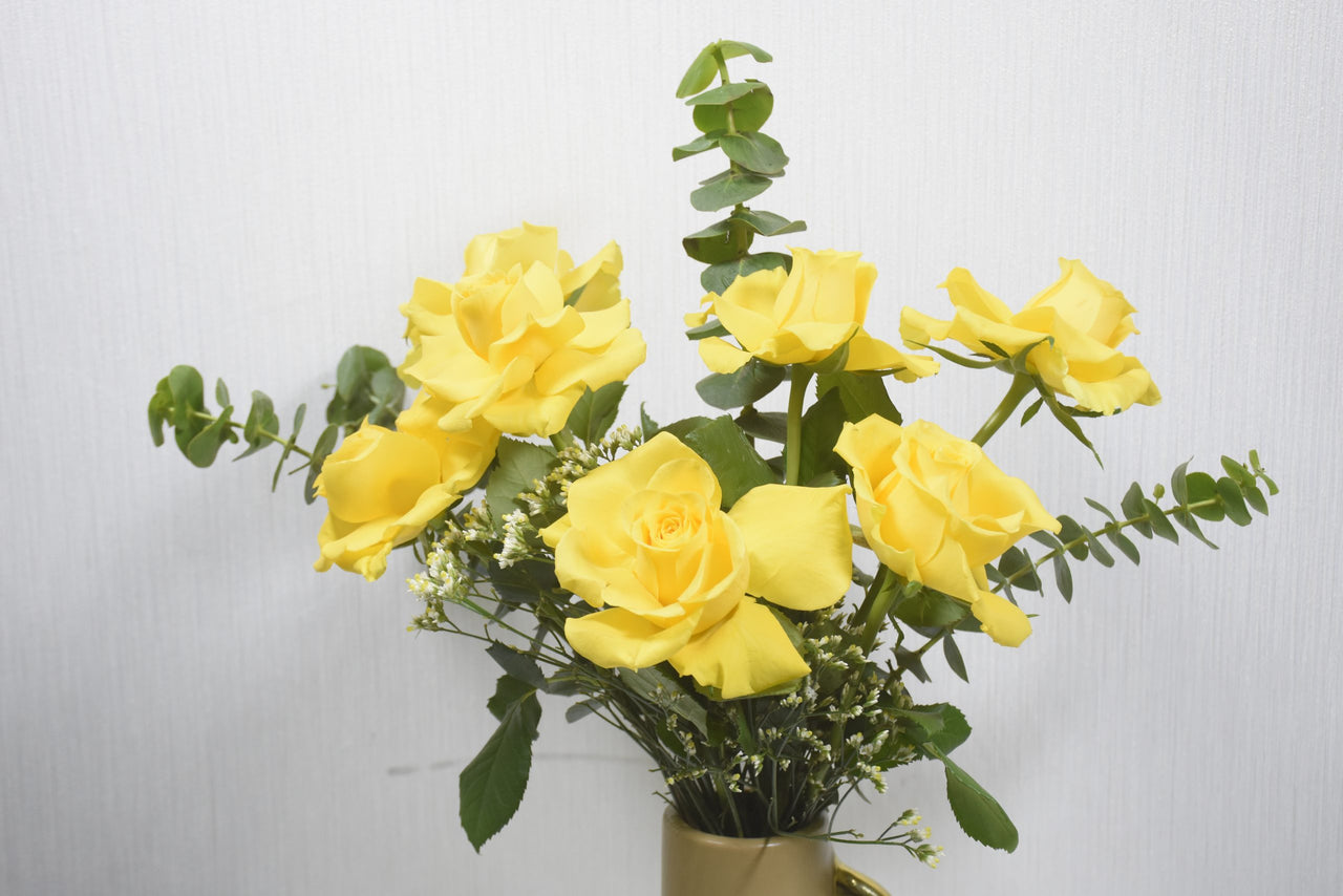 Yellow Rose Harmony: Elegant Floral Arrangement in Ceramic Vase