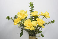 Yellow Rose Harmony: Elegant Floral Arrangement in Ceramic Vase