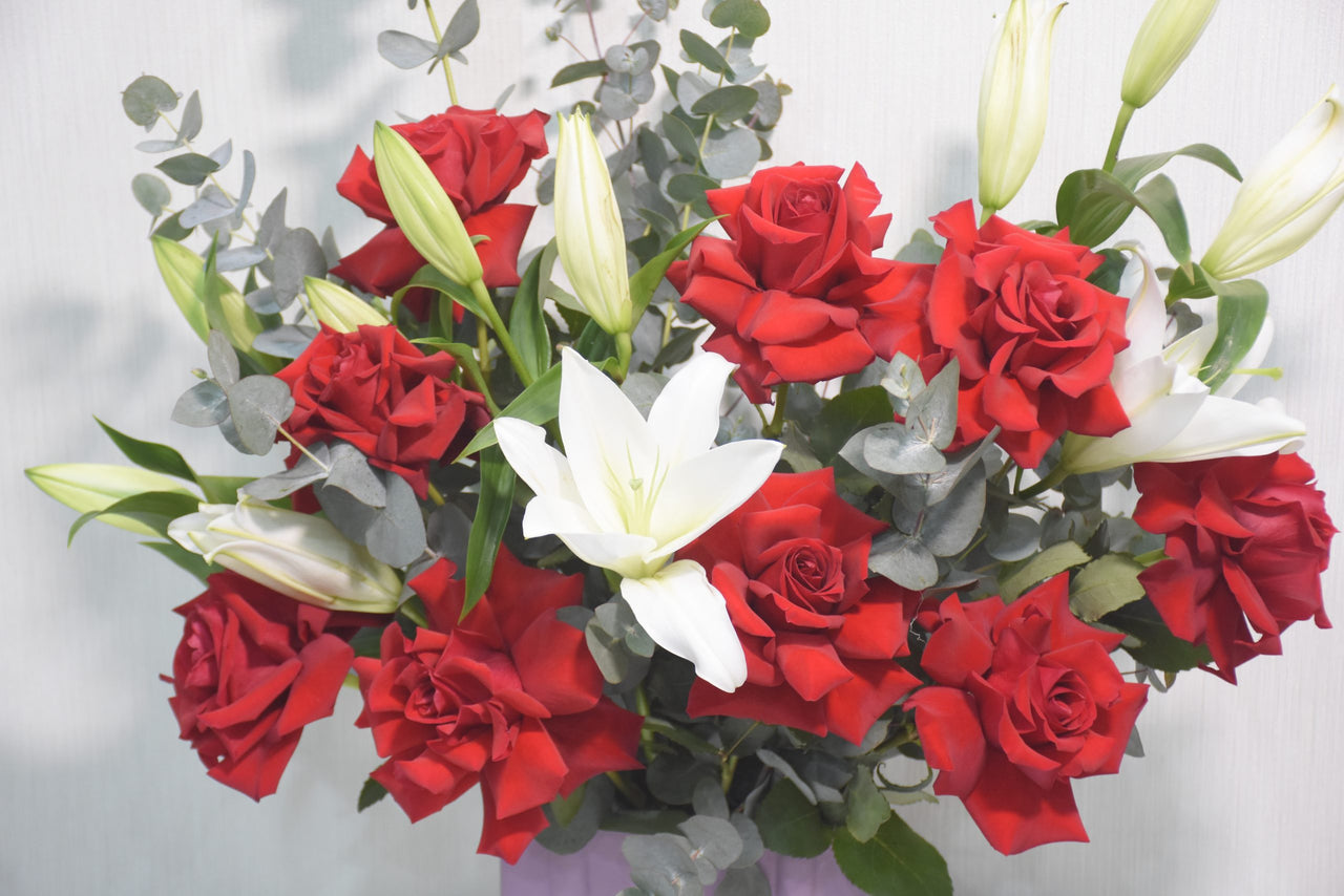 Red Roses, White Lilies, Eucalyptus Arrangement