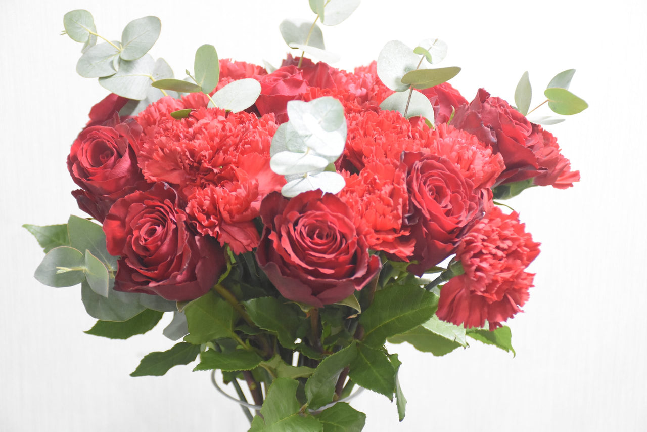 Red Roses & Red Carnation in a Vase
