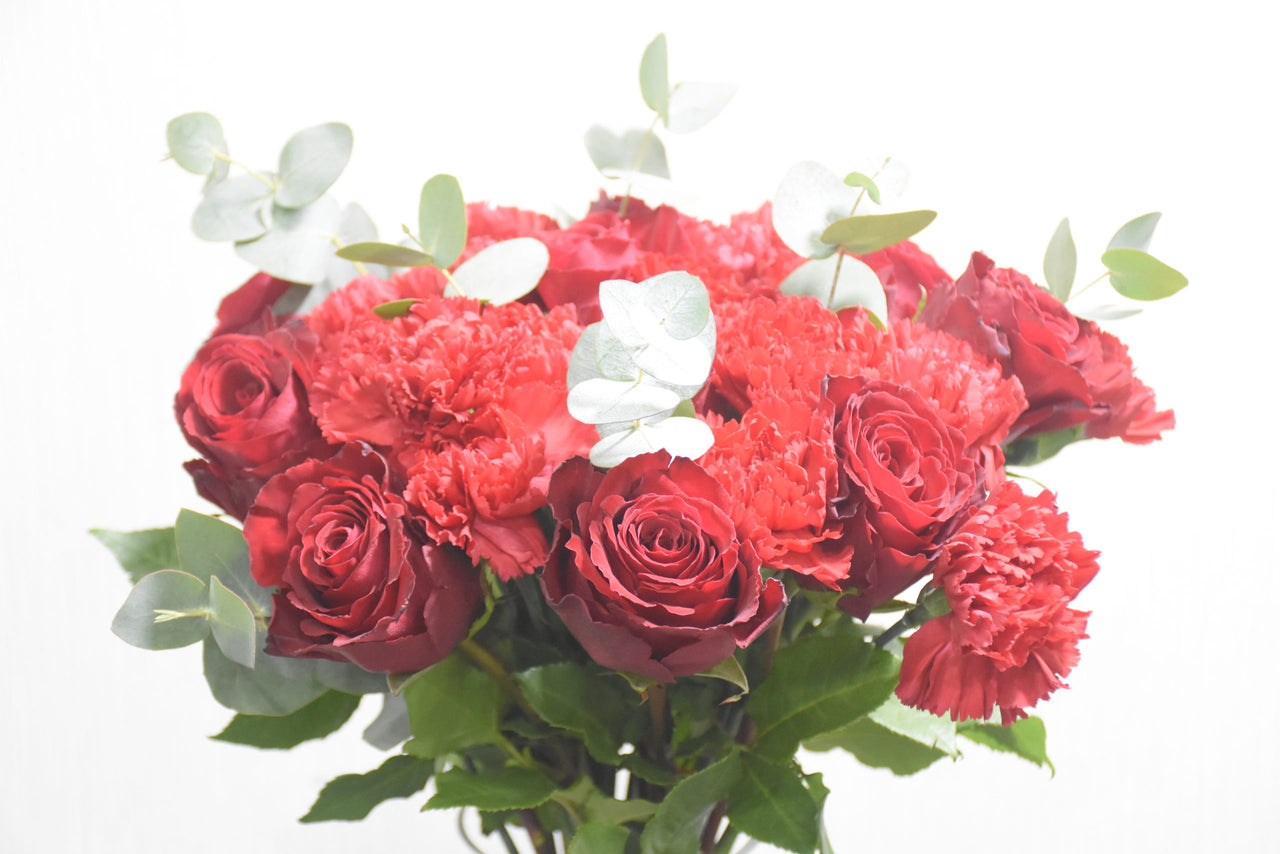 Red Roses & Red Carnation in a Vase
