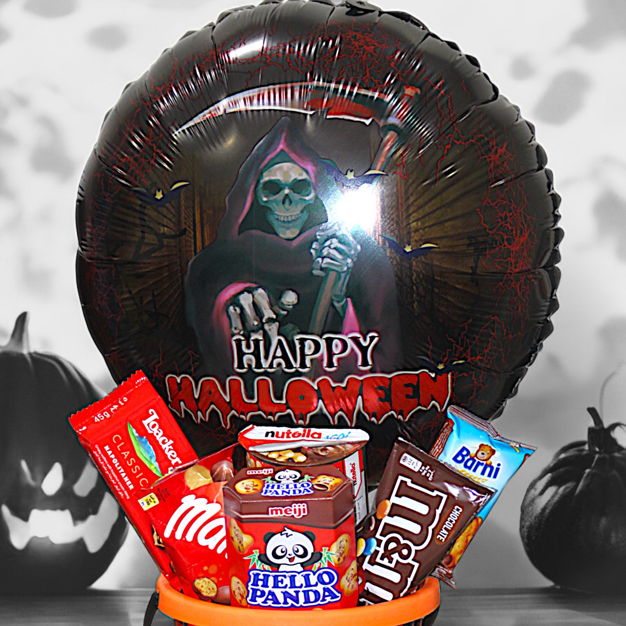 Delightful Halloween Treat Basket with Chocolates and Snacks