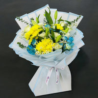 Lilies & Yellow Chrysanthemum Floral Arrangement